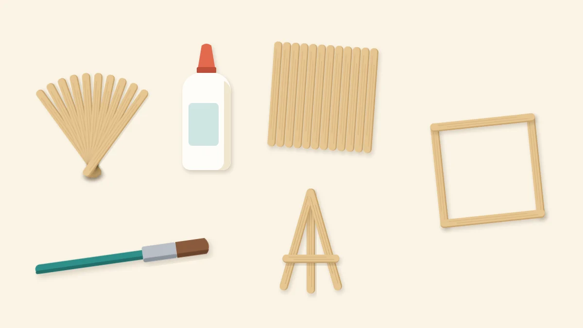 Fanned craft sticks, a glue bottle and brush beside a stick coaster, a small frame and a mini easel